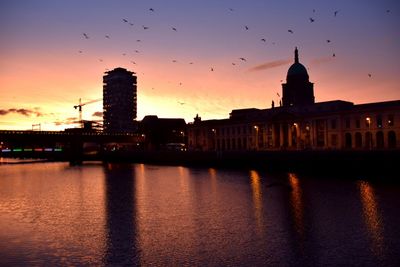Silhouette of building at sunset
