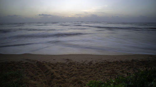 Scenic view of sea against sky during sunset