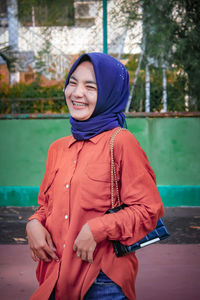 Portrait of a smiling young woman