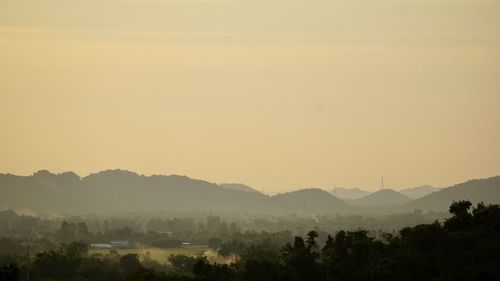 Scenic view of mountains against sky during sunset