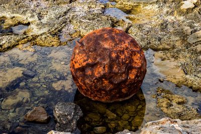 High angle view of rocks in lake