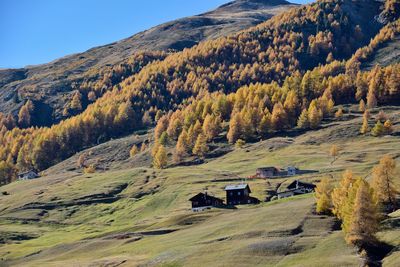 Scenic view of landscape and mountains against sky