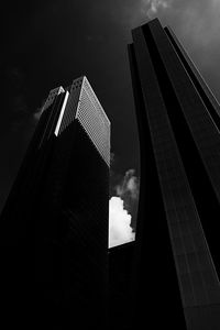 Low angle view of skyscraper against sky