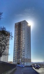 View of buildings against blue sky