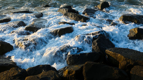 Scenic view of rocks in sea