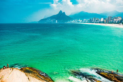 Scenic view of sea against blue sky