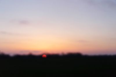 Scenic view of silhouette landscape against sky during sunset