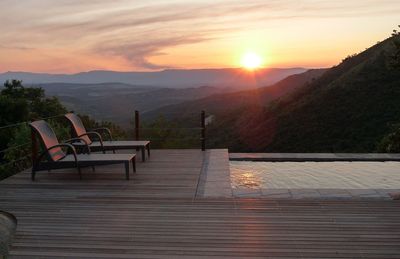 Scenic view of mountains against sky during sunset