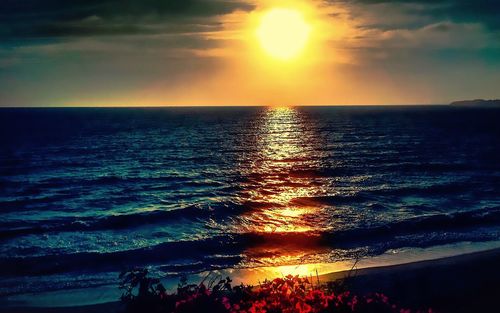 Scenic view of sea against sky during sunset