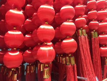 Low angle view of lanterns hanging in market for sale