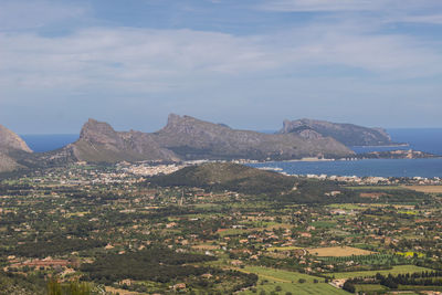 Aerial view of cityscape against sky