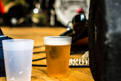 Close-up of beer glass on table