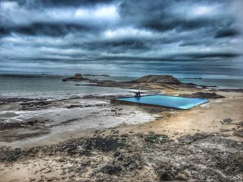 Scenic view of beach against sky