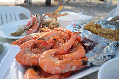 Close-up of shrimps served on table