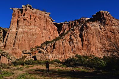 Rock formations on mountain against sky