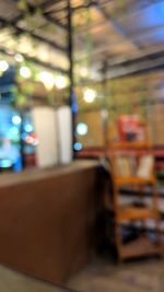 Defocused image of illuminated restaurant