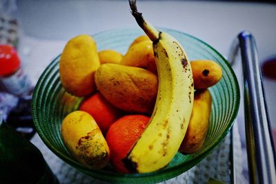 Close-up of fruits in bowl on table