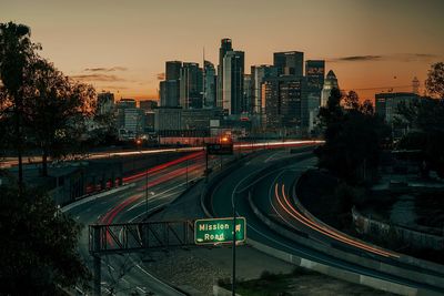 High angle view of light trails on road at night