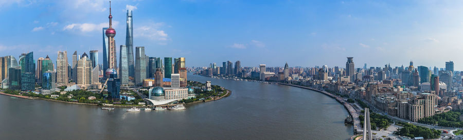 Panoramic view of city buildings against sky