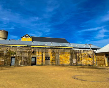 House on field against sky