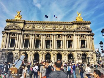 Group of people in front of historical building