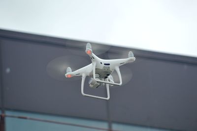 Low angle view of airplane against sky