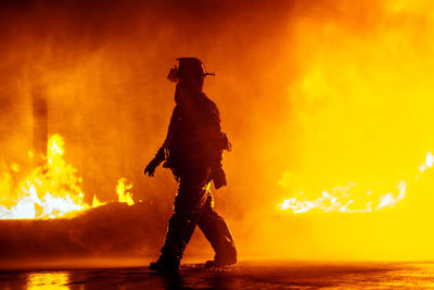 Silhouette of firefighter