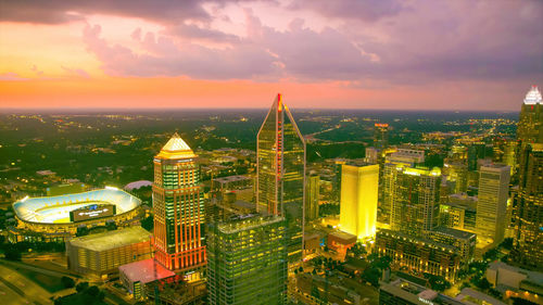 High angle view of illuminated buildings against sky during sunset. charlotte,usa