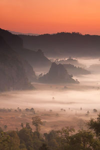 Scenic view of mountains against sky during sunset