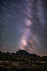 Scenic view of star field against sky at night