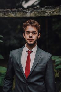 Portrait of young man standing outdoors