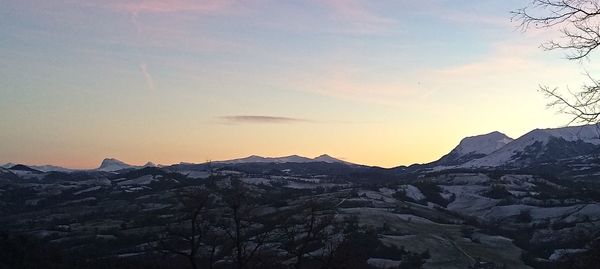 Scenic view of mountains at sunset