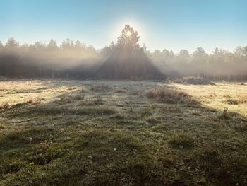 Scenic view of land against sky