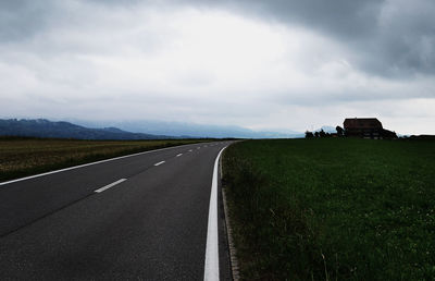 Road on landscape against sky