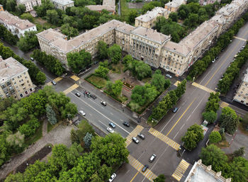 High angle view of vehicles on road in city