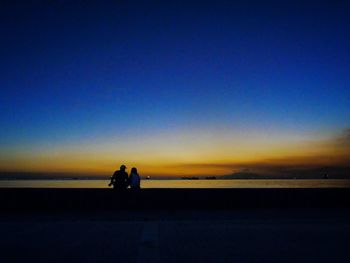 Scenic view of sea at sunset