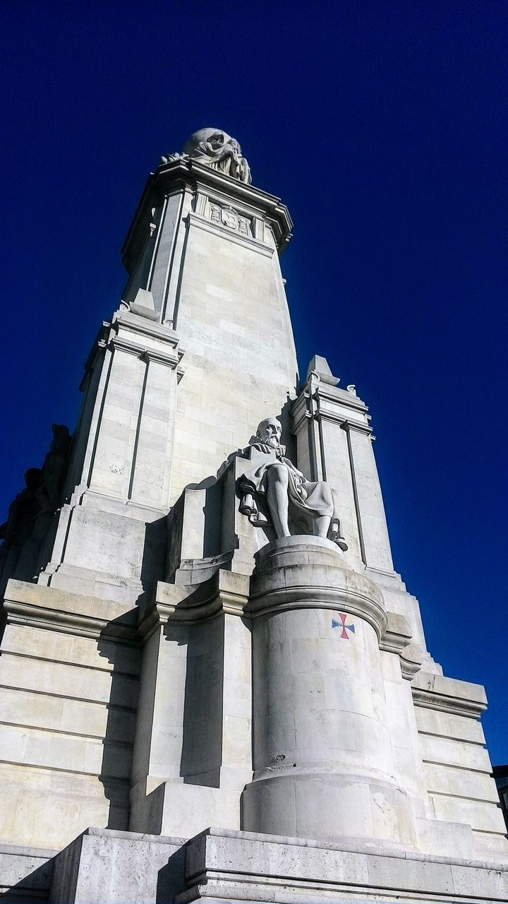 LOW ANGLE VIEW OF STATUE