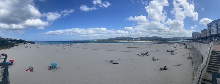 High angle view of people on beach against sky