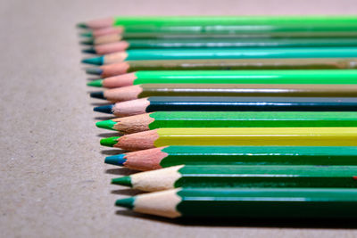 Close-up of colored pencils on table