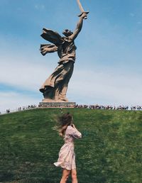 Low angle view of statue against sky