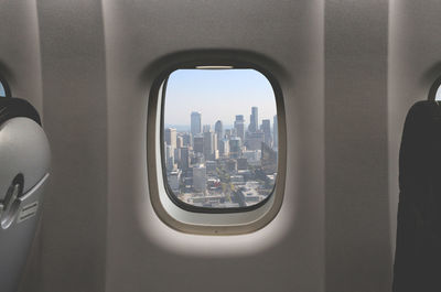 Cityscape seen through airplane window