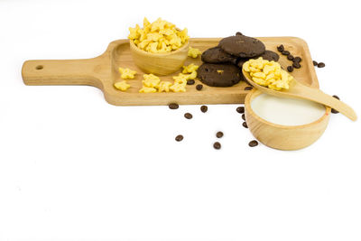 High angle view of cake on table against white background