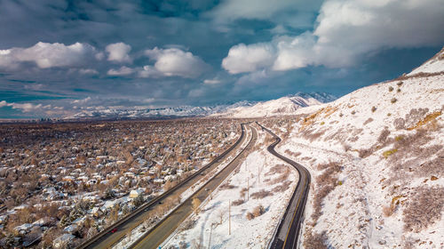 Scenic view of snowcapped mountains against sky