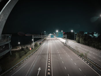 Vehicles on highway at night