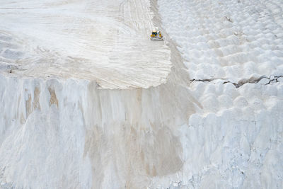 Aerial sunny view of phosphogypsum mountains in kedainiai city, industrial area, lithuania