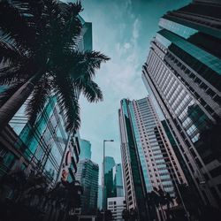 Low angle view of modern buildings against sky