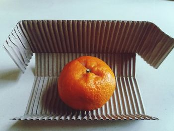 High angle view of orange fruit on table