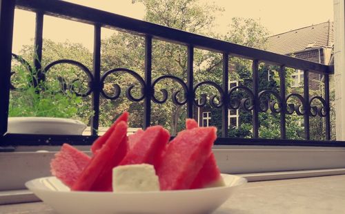 Close-up of red fruit on table