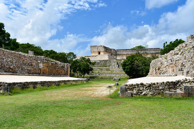 Old ruin building against cloudy sky