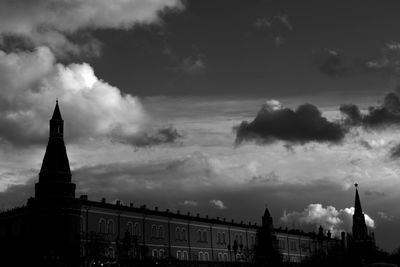 Low angle view of historic building against cloudy sky